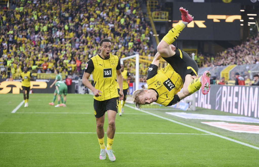 Borusija Dortmund je na četiri boda od mesta koje vodi u Ligu šampiona