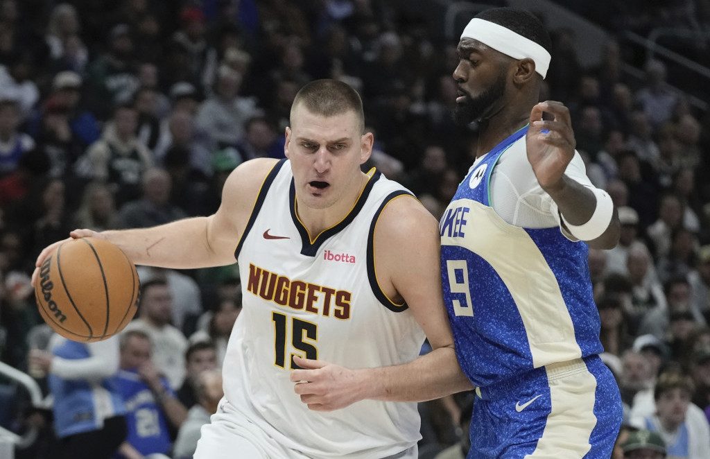 Nikola Jokić u žestokom duelu sa Bobijem Portisom