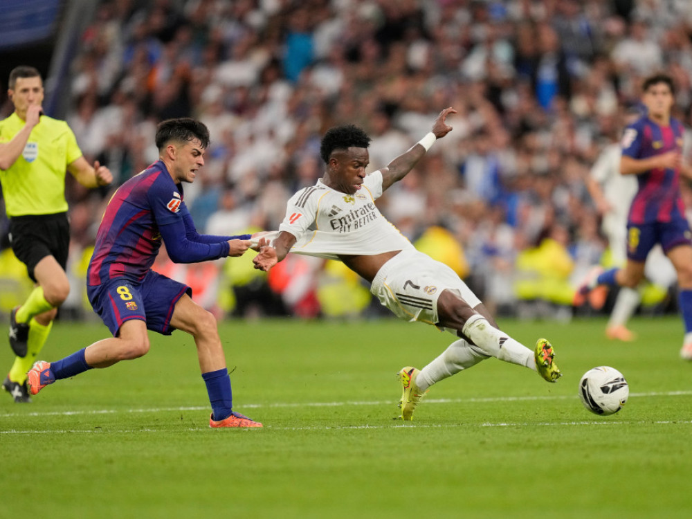 Fudbaleri Barselone i Real Madrida