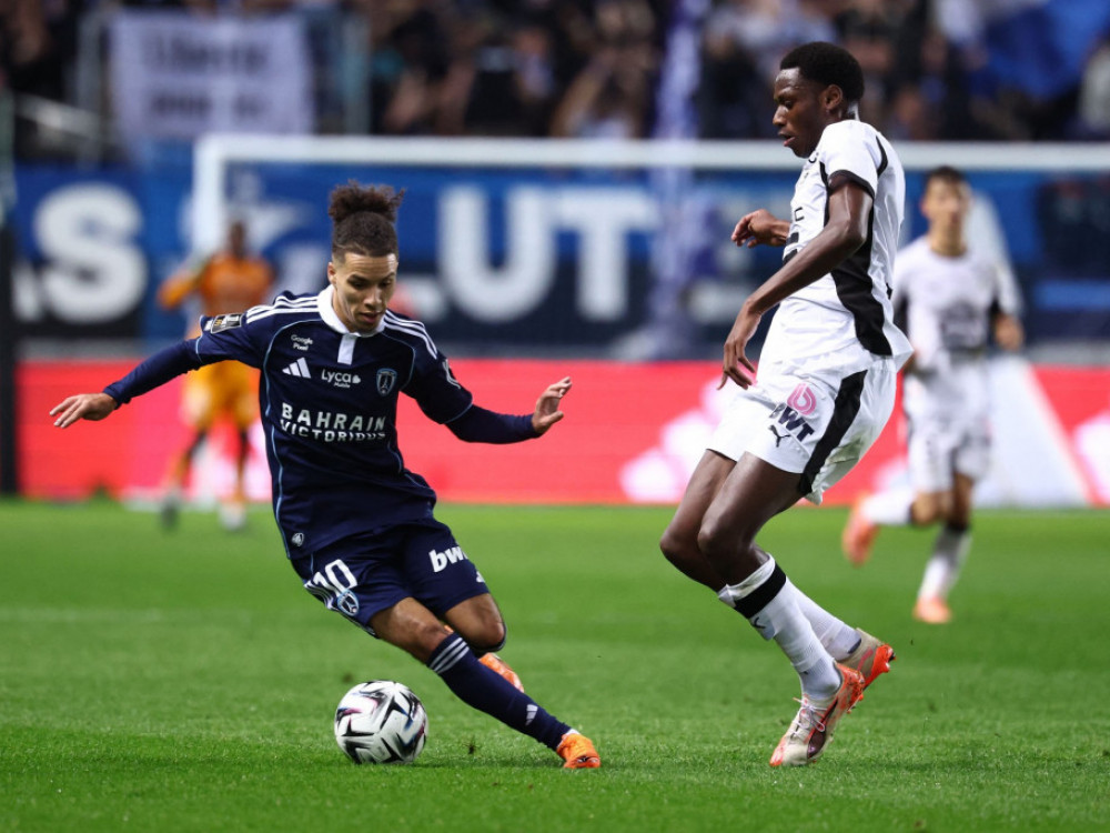 Fudbaleri Pariza i Rena, u utakmici 11. kola Lige 1