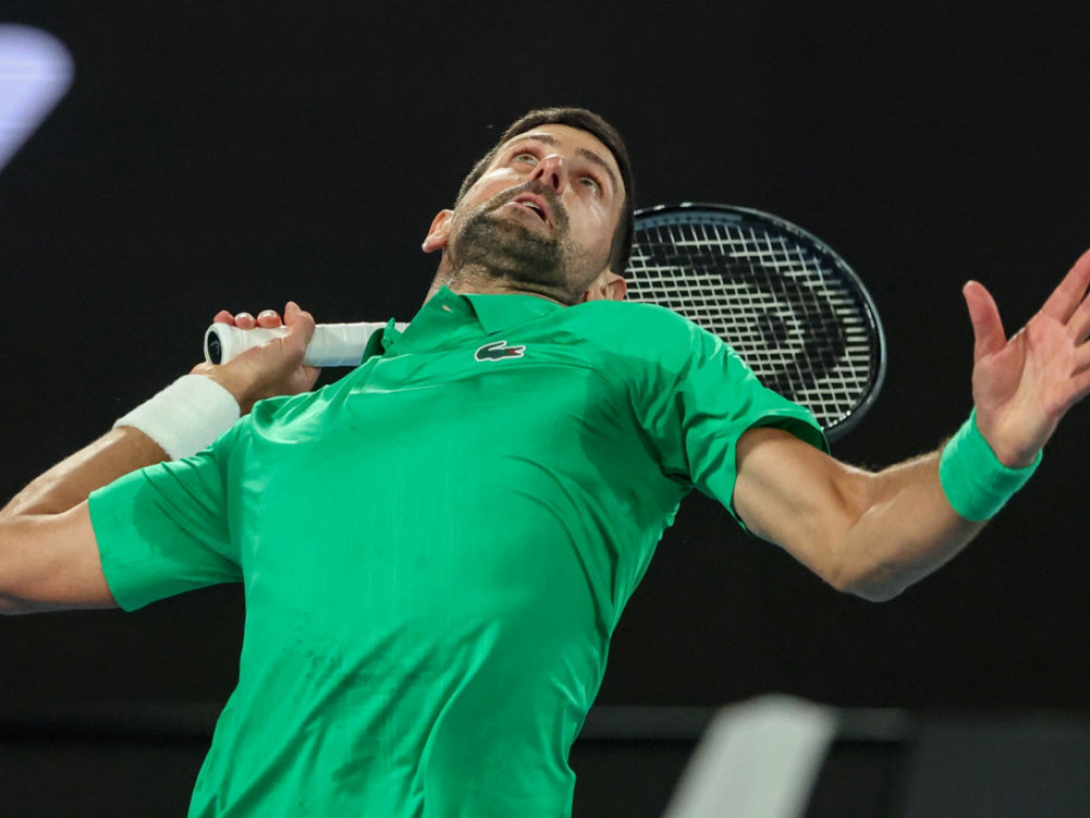 Novak Đoković i Janik Siner, tokom jednog od prošlih AO