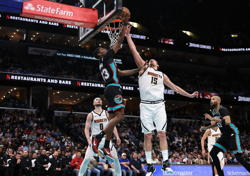 Nikola Jokić i Sedrik Kauard